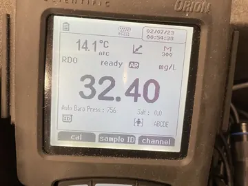 Dissolved oxygen meter reading 32.40 on treated water